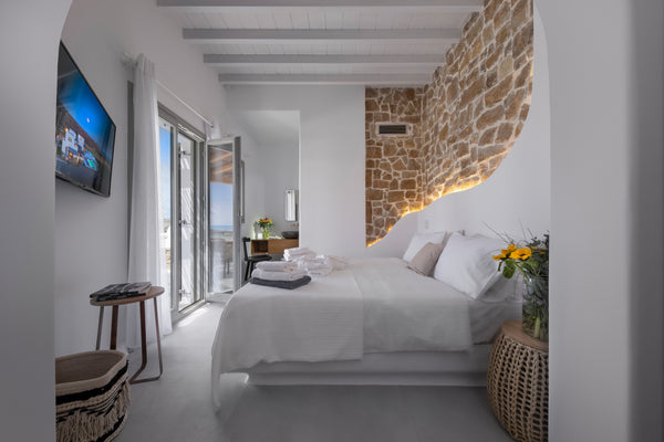 Here, at Legendary Suites Mykonos, we promise to build one of your greatest memo  Legendary Poseidon Deluxe sea view pool jacuzzi Room in boutique hotel vacation rental 49961351