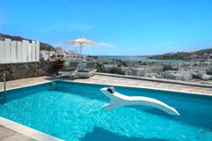Private Jacuzzi<br />This modern apartment has 2 bedrooms, 1 bathroom and an out  Sea View in Ornos Beach Close To Town w Jacuzzi Entire rental unit vacation rental 24662360