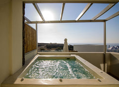 The complex is built with attention to detail and respect for the Cycladic style  Adorno Oia-Deluxe Suite with outdoor heated hydromassage tub Room in hotel vacation rental 49220878