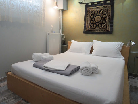 An artistic one bedroom  apartment that sleeps up to 4 guests. It is ten minutes Athens, Attica, Greece Style and comfort, lovely neighourhood! Entire rental unit vacation rental 26148339