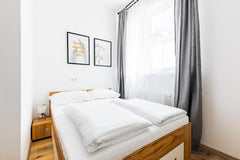 The modern furnished accommodation offers space for two guests and is located in Vienna, Austria BEAUTIFUL AND MODERN APARTMENT Private room in condo vacation rental 33987420