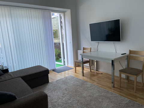 A cozy, modern apartment including a separated living room with direct access to Chișinău, Moldova Perfectly located modern apartment with terrace Entire rental unit vacation rental 649525422840955145