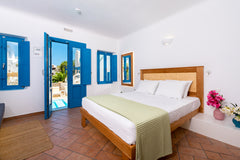 Situated on the beach of Kamari<br /><br /><b>License number</b><br />1156127 Kamari, Greece Junior Suite with Pool View by SeaSide Breeze Private room in bed and breakfast vacation rental 52751953