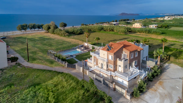The modern 4-bedroom Villa, extends to an estate of almost 500 sqm with private   4-bedroom Villa next to the beach by Delfus Entire villa vacation rental 699034979964833624