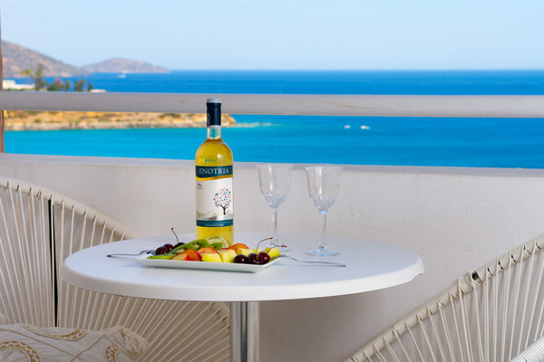 Laze at the balcony of our wonderful apartment and feast your eyes on the amazin Agios Nikolaos, Greece Grant Sea View apartment, Bellevue Suites Entire rental unit vacation rental 49171750