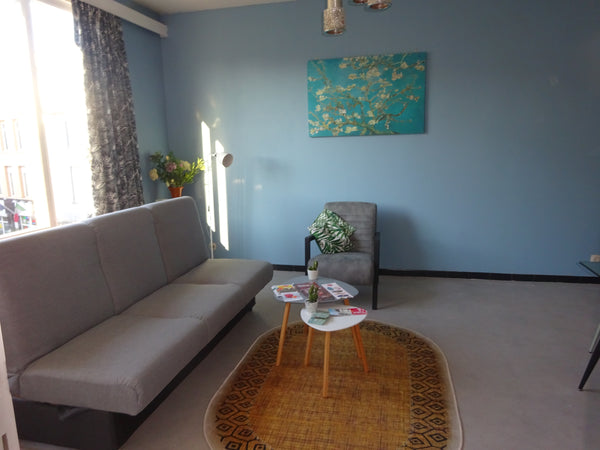 The apartment has 1 bedroom with 3 individual beds. In the living room you have  Antwerpen, Belgium Renovated 70s apartment Entire rental unit vacation rental 31682997