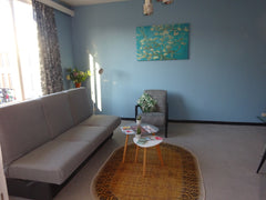 The apartment has 1 bedroom with 3 individual beds. In the living room you have  Antwerpen, Belgium Renovated 70s apartment Entire rental unit vacation rental 31682997
