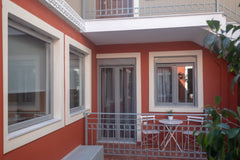 Athenian Yard Suites are housed in an old Athenian house of the early 20th centu Heraklion, Greece Athenian Yard Suites 40 Sq.m with balcony Room in aparthotel vacation rental 34299065