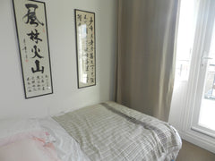 Quiet and cosy small bedroom (around 6sq.m., double bed 130x190cm) with a balcon Paris, France Bedroom in the sky, view on the Eiffel Tower Private room in bed and breakfast vacation rental 3995560