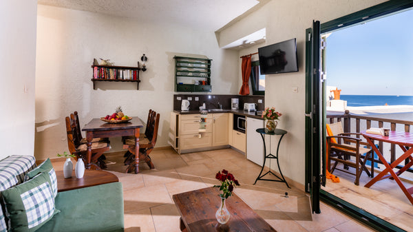 Situated directly on the sea, on a rocky seashore, in the small fishing village  Sisi, Greece Porto Sisi Suite with Sea View Room in serviced apartment vacation rental 34375541