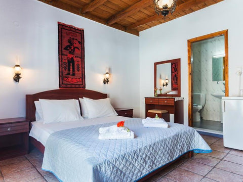 All rooms are sea view with balcony and offer air conditioning, 43" flat TV and  Loutro, Greece Double Room with Seaview Room in hotel vacation rental 21728468