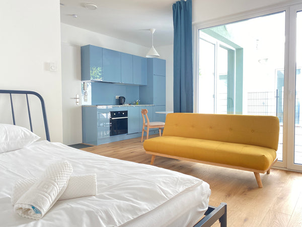 Lofty studio apartment with big windows and a tiny garden area near Danube River Vienna, Austria AP 1 - Loft very close to subway (U2) w/ garden Entire condo vacation rental 708698615721033688