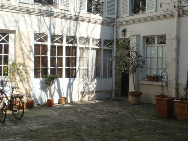 In a calm oasis in the very heart of le Marais, a typical Parisian studio in a X Paris, France a'feel-good' place