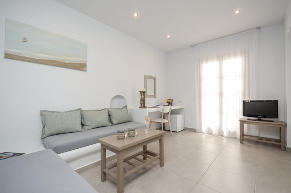 Decorated in Cycladic style, this elegant suite features free WiFi, safe, air co  Suite with hydromassage shower cabin Room in boutique hotel vacation rental 48190986