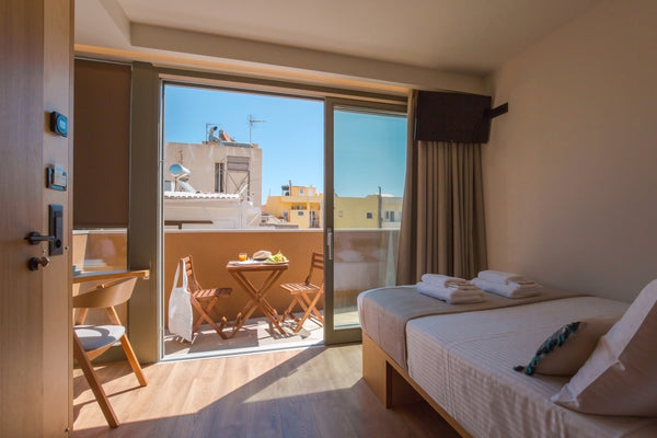 Discover a modern and refined environment inside an ancient historical building   06-Suite Junior Suite with Balcony | Old Town view Room in boutique hotel vacation rental 569338222552893987