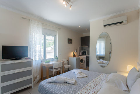 At the top of the bulding, is also a 25sq m2 penthouse surrounded with a terrace Athens, Greece Paleochora houses top penthouse Entire rental unit vacation rental 12305831