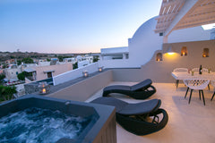 Tholos comes with a loft bedroom and an open plan ground floor, consisting of a  Greece Thólos | Shades of White Cycladic home vacation rental 25044229