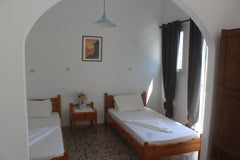 The private spacious room on the 1st floor has two single beds and one double, a  Spacious Private Room for Four in Paros! Private room in condo vacation rental 44525399