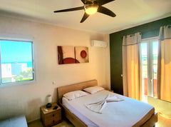 Athena is a second floor 60sq luxury apartment with 2 bedrooms (one with sofa wh Greece Athena - Luxury Apartment on the beach of Lachania Entire rental unit vacation rental 37848688