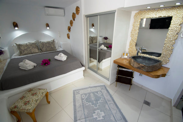 Newly created single/small double with A/C, WiFi, mini fridge, bathroom, TV. It  Greece Petite Double with Pool close to Town. Private room in bed and breakfast vacation rental 7473267