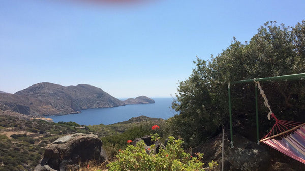 A new and clean house with amazing view. It has a double bed, a WC with shower,   ECO home sunset& sea on the hill 10 min w from sea Cycladic home vacation rental 44119915