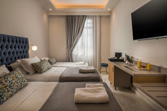 Plaza 1866 Superior City Rooms is located in the heart of the city of Chania. Th  Plaza 1866 Superior City Rooms/ Deluxe Triple Private room in serviced apartment vacation rental 46307378