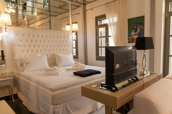 IDEA is the name of this luxury suite.<br />Black and white are the colors selec Athens, Greece Faces Art Suites | Luxury Apartment  