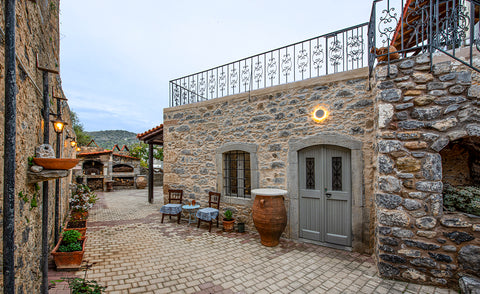 " Manousaki " is located in village Milatos surrounded by hight mountains and ce  "Manousaki"traditional stone house Entire villa vacation rental 604244773290444186