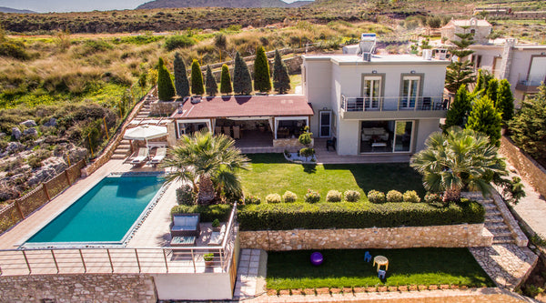 Overlooking an outdoor private swimming pool and views of the sea, the magnifice Greece Gouves Panorama Luxury Villa Entire villa vacation rental 11528405