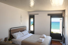 Built in a seaside village named Kokkini Hani overseeing the Cretan sea just 50  Heraklion, Greece Sunshine Apt- Unique Holidays by the Sea Entire rental unit vacation rental 44025446