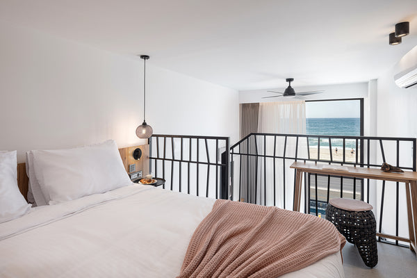 The amazing Loft Suite with elevated open bedroom on the upper floor make an ecl Rethimnon, Greece Seafront Loft Suite with direct sea view Room in boutique hotel vacation rental 673939107549895871