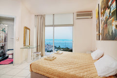 Loucerna Art Hotel offers this tastefully decorated single room with a balcony o Chania, Greece Loucerna Art B&B Superior Room With Sea View Room in bed and breakfast vacation rental 33966037