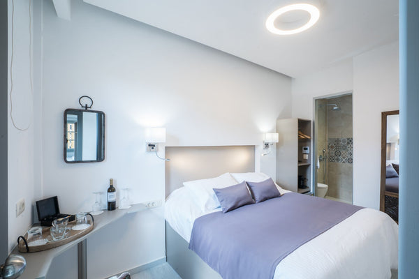 Our cozy double room is a nice option for couples. The location is excellent to   Portou str. 1st Floor Economy Room Room in boutique hotel vacation rental 32150601