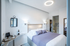 Our cozy double room is a nice option for couples. The location is excellent to   Portou str. 1st Floor Economy Room Room in boutique hotel vacation rental 32150601