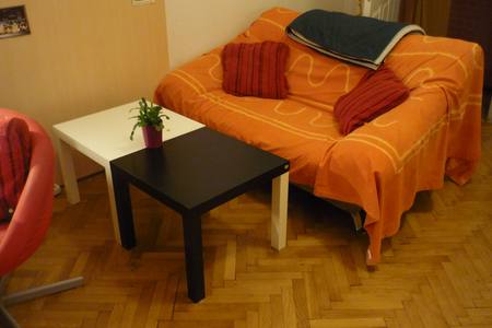 The room has furniture. Bed, Table with work surface, Couch, a shelf with storag Vienna, Austria cozy room very central in Vienna Private room in rental unit vacation rental 30974146