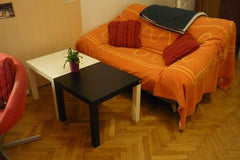 The room has furniture. Bed, Table with work surface, Couch, a shelf with storag Vienna, Austria cozy room very central in Vienna Private room in rental unit vacation rental 30974146
