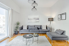 Stride across golden parquet floors that feel warm underfoot in a bright and min Athens, Greece Elegant Apartment near Ritzy Cafes next to Mount Lycabettus Entire rental unit vacation rental 25469182
