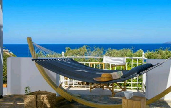 A small villa drowned in a mediterranean orchard right next to the sea, situated Agios Nikolaos, Greece The Epicurean Entire home vacation rental 557985555813629669