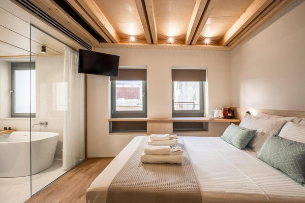 Discover a modern and refined environment inside an ancient historical building   03-Suite Deluxe with Bath Tub | First Floor Room in boutique hotel vacation rental 569263304099675522