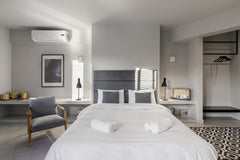 Minimal decoration, fine furniture, functionality and spaciousness are the main  GR Heart of Athens | Premier Suite with Street View Entire rental unit vacation rental 17954149
