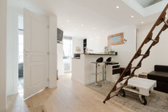 This cozy flat is fully equiped and has a main room under the rafters, a spaciou Paris, France Charming Appartment - Notre Dame - île Saint Louis Entire rental unit vacation rental 12912564