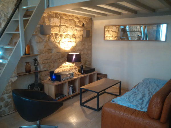 Appartement parisien chaleureux au style campagne chic.<br />Doté d'un astucieux Paris, France Appartement chaleureux avec beau volume Entire loft vacation rental 22396106