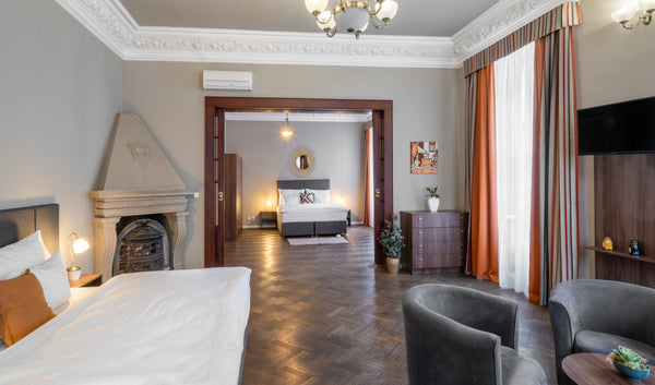 Enjoy your stay in our Suite that offers two comfortable king size beds. You can  Suite - Palac U Kocku Room in hotel vacation rental 53729859