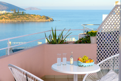 Enjoy your morning coffee and watch the sea. Get a cold beer or eat a fresh sala Agios Nikolaos, Greece Modern Studio with Sea View, Bellevue Suites Entire rental unit vacation rental 13994234