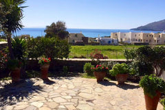 The 70 sq.m. house is part of a complex located in Kato Agios Petros, 250 m away Athens, Greece Cycladic house near the sea (250 m) Cycladic home vacation rental 32045566