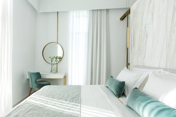 The corner and ultra-bright Emerald suite has a modern bedroom with a king-size  Chania, Greece Emerald Suite - Mirabile Luxury Suites Room in boutique hotel vacation rental 44722542