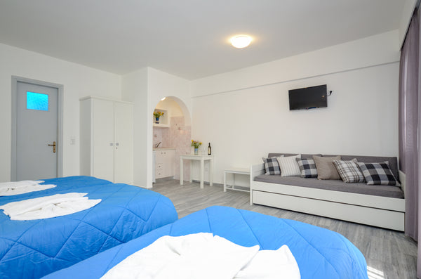 Soula Hotel is a friendly family-run hotel which is located 30 meters from the s  Soula Superior Quadruple Studio with 1Sofabed Plus Room in hotel vacation rental 43379337