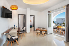 The beautiful view of the garden combined with the pool view and partially the s  Abasa Suites '' Family Suite'' Room in hotel vacation rental 42650719