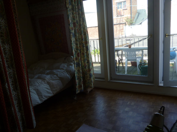 the room is big and comfy, with a terrace , a view over the roofs, a private bat Brussels, Belgium Big beautiful room with bathroom and terrace Private room in rental unit vacation rental 13517456
