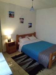 The room is located in the hill of the village. It includes one double bed, a fr  room2 Private room in rental unit vacation rental 10975892